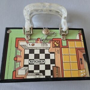 Unique handbag made from vintage CLUE game board!